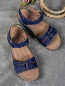 Ladies' beige wedge heel sandals with adjustable ankle straps, breathable perforated design, casual summer fashion