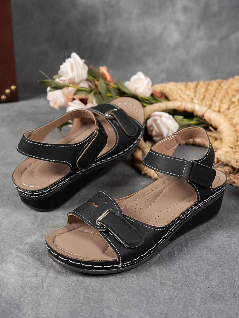 Ladies' beige wedge heel sandals with adjustable ankle straps, breathable perforated design, casual summer fashion