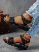 Ladies' beige wedge heel sandals with adjustable ankle straps, breathable perforated design, casual summer fashion