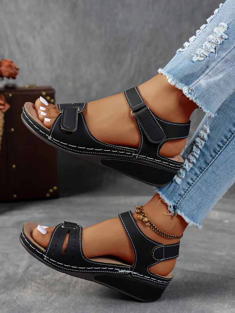 Ladies' beige wedge heel sandals with adjustable ankle straps, breathable perforated design, casual summer fashion