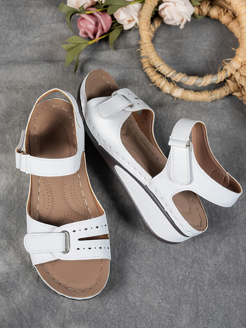 Ladies' beige wedge heel sandals with adjustable ankle straps, breathable perforated design, casual summer fashion