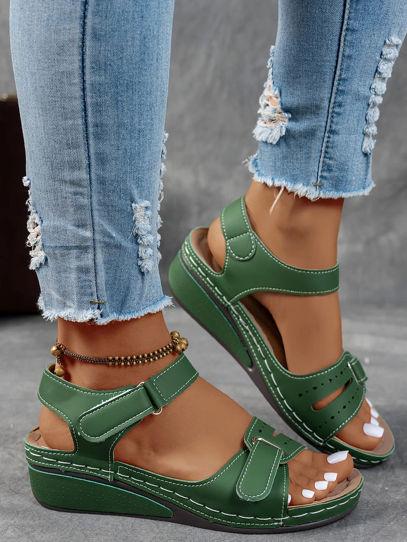 Ladies' beige wedge heel sandals with adjustable ankle straps, breathable perforated design, casual summer fashion