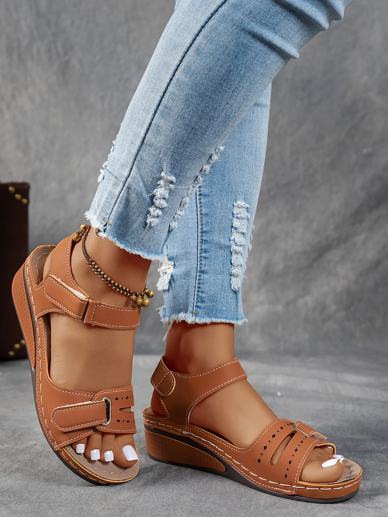 Ladies' beige wedge heel sandals with adjustable ankle straps, breathable perforated design, casual summer fashion