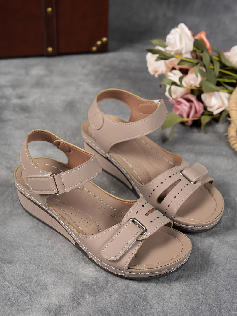 Ladies' beige wedge heel sandals with adjustable ankle straps, breathable perforated design, casual summer fashion