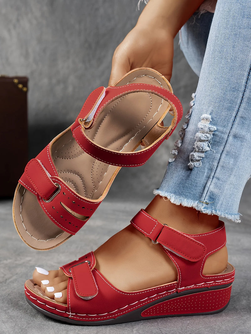 Ladies' beige wedge heel sandals with adjustable ankle straps, breathable perforated design, casual summer fashion