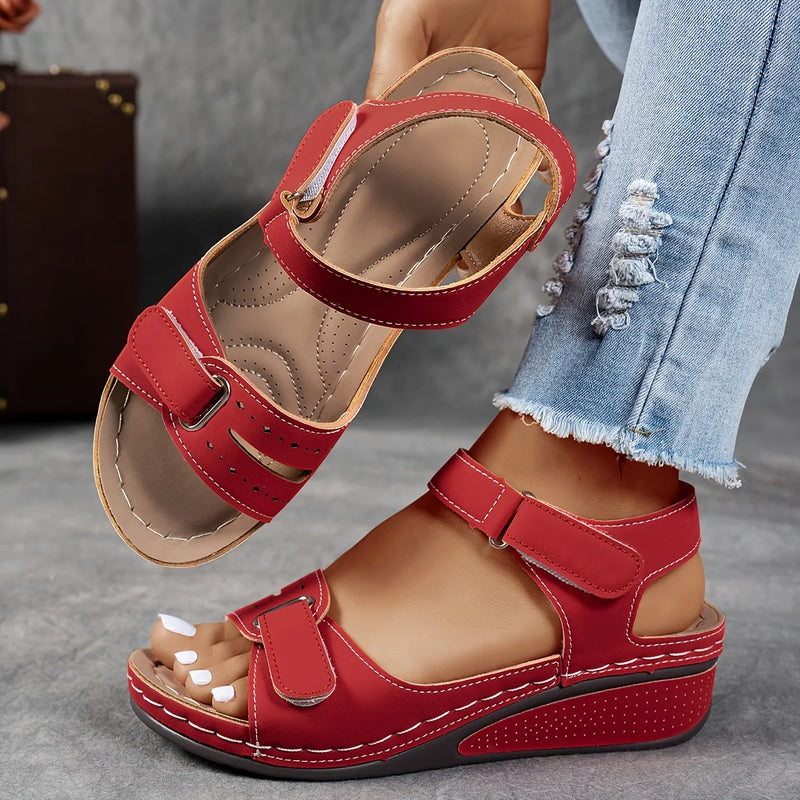 Ladies' beige wedge heel sandals with adjustable ankle straps, breathable perforated design, casual summer fashion