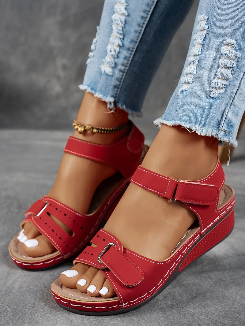 Ladies' beige wedge heel sandals with adjustable ankle straps, breathable perforated design, casual summer fashion