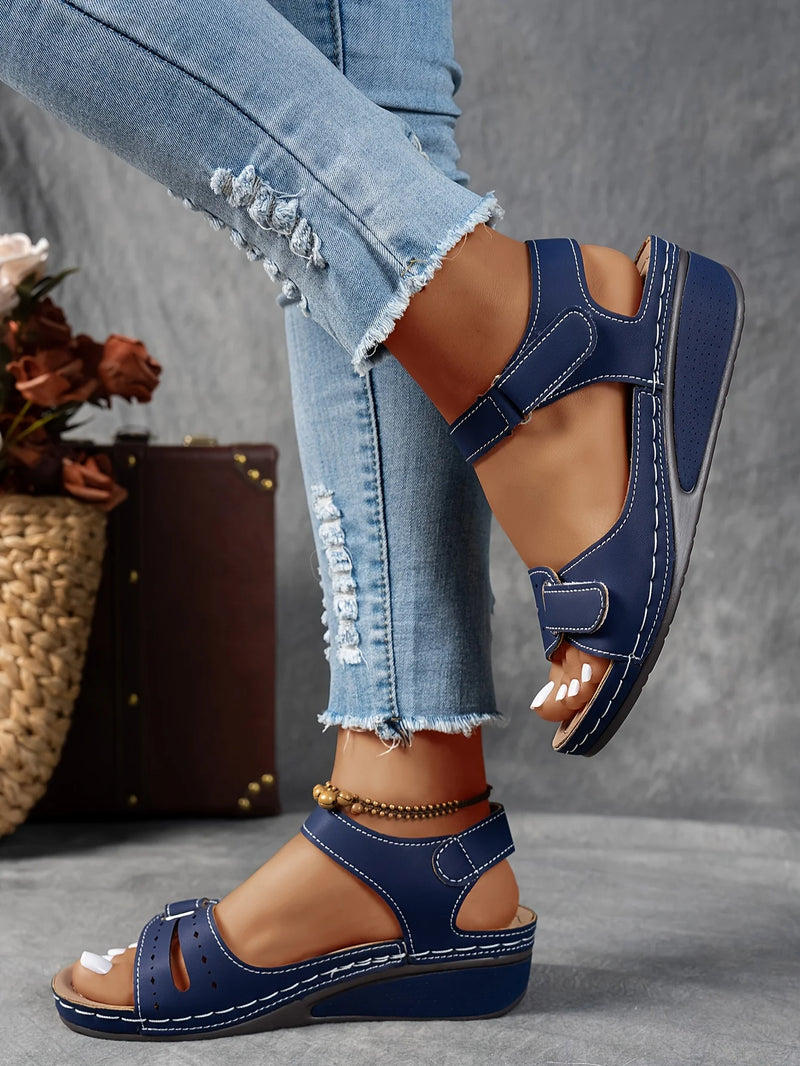 Ladies' beige wedge heel sandals with adjustable ankle straps, breathable perforated design, casual summer fashion