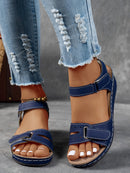 Ladies' beige wedge heel sandals with adjustable ankle straps, breathable perforated design, casual summer fashion