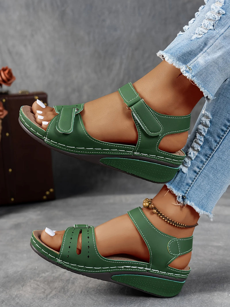 Ladies' beige wedge heel sandals with adjustable ankle straps, breathable perforated design, casual summer fashion