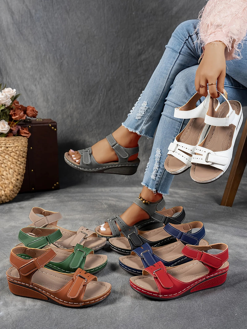 Ladies' beige wedge heel sandals with adjustable ankle straps, breathable perforated design, casual summer fashion